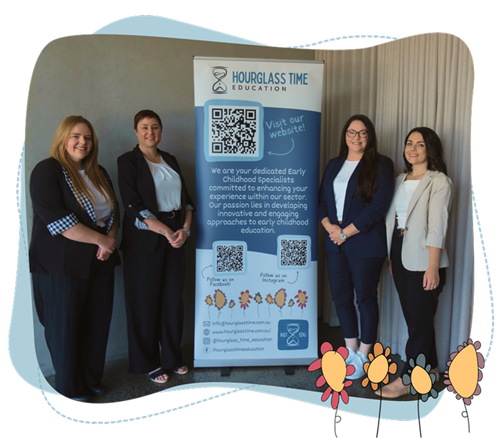 Four women stand beside an Hourglass Time Education banner featuring text, social media icons, and QR codes in a light-coloured room with a floral graphic overlay at the bottom.